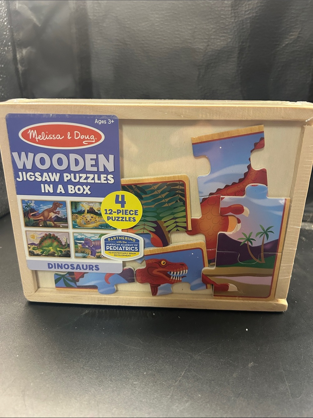 Melissa & Doug Wooden Dinosaur Jigsaw Puzzle Set - Blue, Red, Green, Yellow